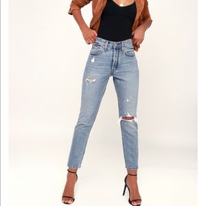 Levi’s 501 distressed light wash jeans